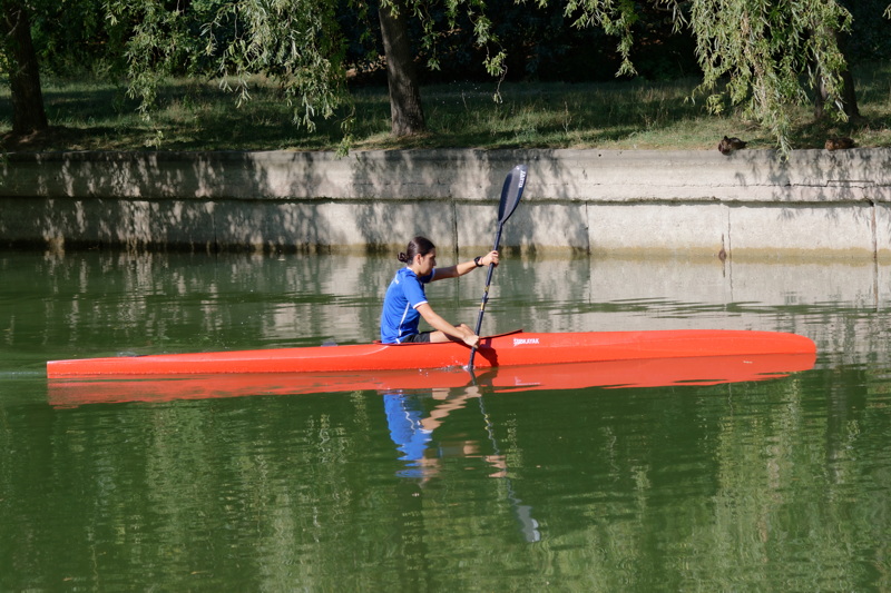 Girl rowing a kayak